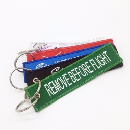 China newest design fabric woven label sport key chain custom embroidery keychain
