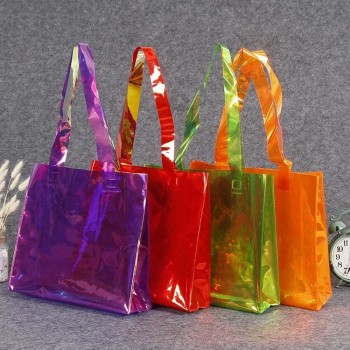 Fábrica al por mayor de plástico PVC Tote Bag color Tote Shopping Bag ropa láser regalo embalaje Bolsa de impresión