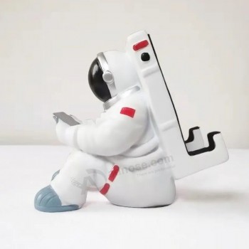 カスタマイズされた創造的な宇宙飛行士の携帯電話ホルダーは、クリスマスのための最高の贈り物になります