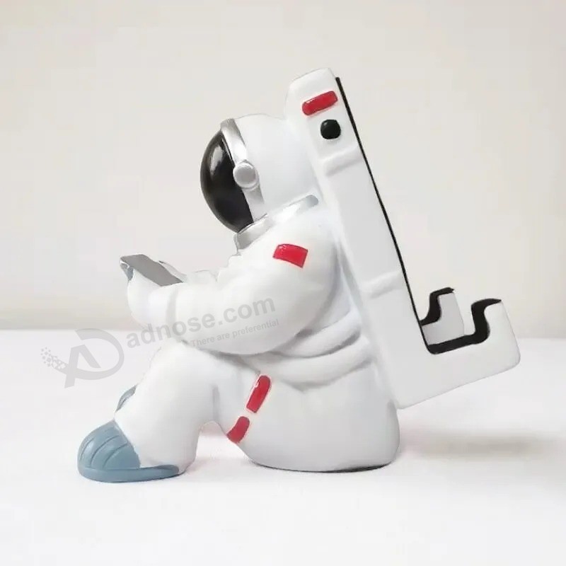 El mejor regalo creativo modificado para requisitos particulares del soporte del teléfono móvil del astronauta para la Navidad