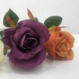 七彩人造花玫瑰色芽作为装饰和礼品