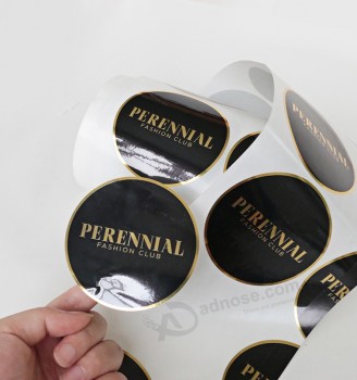Custom adhesive vinyl waterproof logo sticker, synthetic paper bottle stickers, roll self adhesive product sticker printing