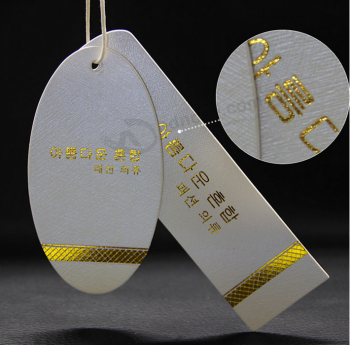 Etiqueta de papel de encarGraMetrooo de la ropa de la hoja de oro para la venta
