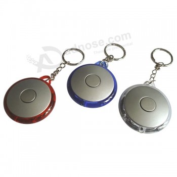 En gros personnalisé hauTe qualiTé forme ronde populaire conduiT lumière keychain