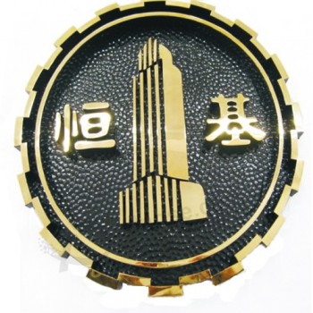 логотип оптовой компании покрыл выгравированный золотой знак