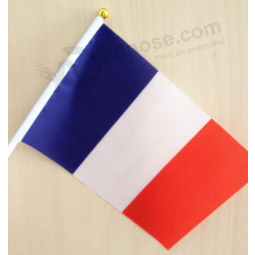 La bandera de mano al por mayor de la fábrica señala a mano la bandera de Francia