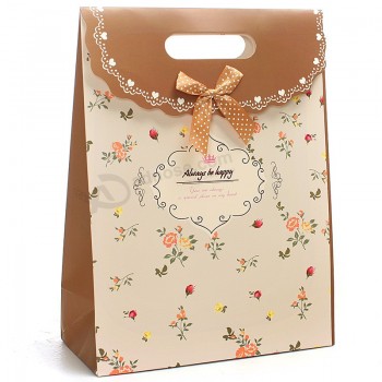 Bolsa de regalo de papel sweety venta caliente con arco personalizado