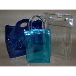 批发定制高品质生态-友好的透明PVC手提包，纽扣开合