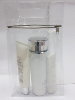 Bolsa cosmética clara personalizada de alta calidad del Cloruro de polivinilo con el agujero que cuelga