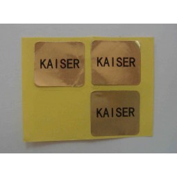 Groothandel aangepaste hoge kwaliteit gouden achtergrond met zwarte woord laBel Sticker.