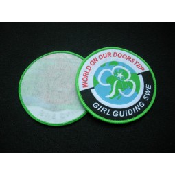 Factory direct wholesale customized top quality Round Shape Green Merrowed Border Woven Badge