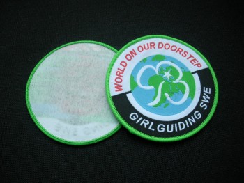 Factory direct wholesale customized top quality Round Shape Green Merrowed Border Woven Badge