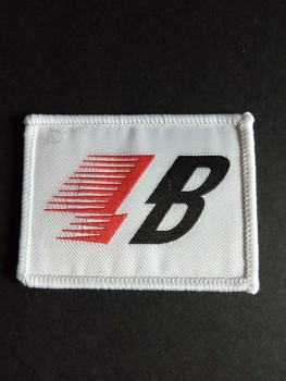 Wholesale customized high-end Ovelocking White Clothing Woven Badge