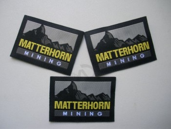 Wholesale customized high-end Taffeta Quality Laser Cut Border Clothing Woven Label