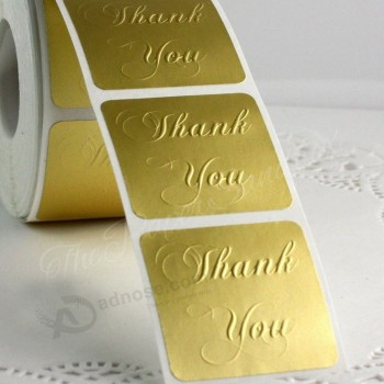 Buena venta gloosy lámina de oro en relieve etiqueta de metal