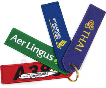 Remove embroidered woven fabric key tag for sport