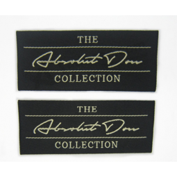 Garment embroidered iron on label with brand logo