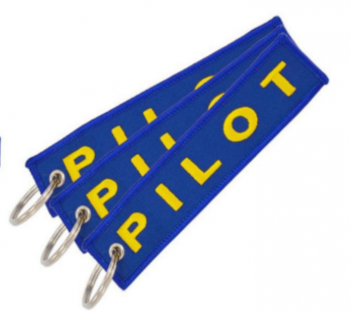 Logotipo personalizado bordado tela etiquetas de llavero piloto