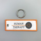 Kundenspezifische coole Art formte Ihr Logo speziell gemacht gewebt keychain