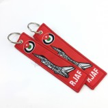 Hoge kwaliteit custom dubbele merklogo stof borduurwerk sleutelhanger voor vliegtuig