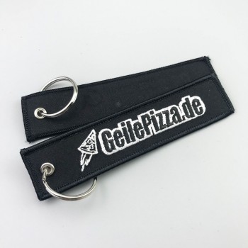 Prezzo di fabbrica vendita diretta promozione ricamo personalizzato tessuto logo tessile portachiavi con cucito in oro