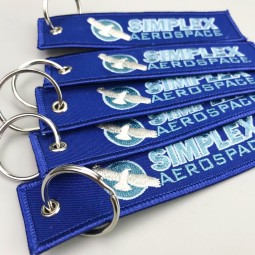 Llavero amonestador de la tela del bordado del color de encargo, llaveros personalizados del diseño