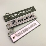 Großhandel billig twill promotion maschine stickerei benutzerdefinierte gewebte textil logo keychain hersteller