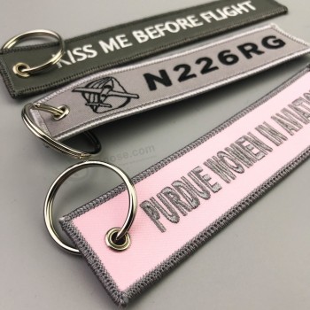 Promotion high quality new design top hot sale embroidered key chain/keychain with yuor logo