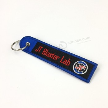 Cheap custom hot selling embroidery badge grat quality keychain