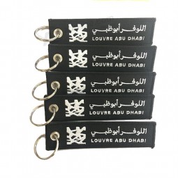 Custom flag logo fabric flight tag woven embroidery key chain for shoe with high quality