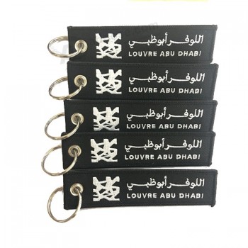 Custom flag logo fabric flight tag woven embroidery key chain for shoe with high quality