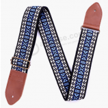 Sangle guitare bleu vintage tissée jacquard avec extrémités en cuir véritable