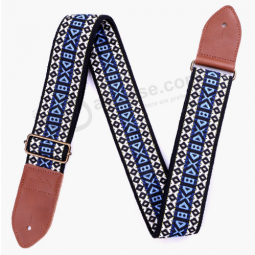 Sangle guitare bleu vintage tissée jacquard avec extrémités en cuir véritable