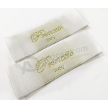 étiquette en satin tissé avec logo personnalisé haute densité pour vêtements