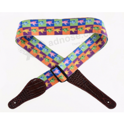 Sangle de guitare artistique en polypropylène à motif sunburst avec extrémités en cuir PU