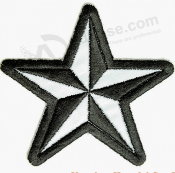 Garment badge over locking embroidery patch star logo