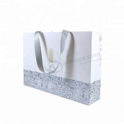 Custom clothing store use hot stamping gold logo gift shopping paper bag with ribbon handle
