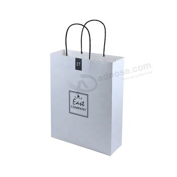热卖品牌礼品纸袋，带有自己的logo白色牛皮纸购物袋