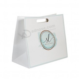Bolsas de papel personalizadas Bolsa de papel de arte laminado de lujo con mango recortado