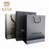 Usine bon marché haute qualité luxe noir mat personnalisé imprimé sac de cadeau de vente au détail en papier pour le shopping