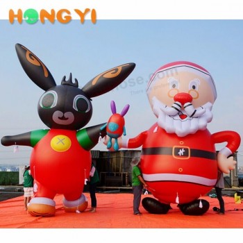 Großer aufblasbarer Weihnachtsmann und niedlicher aufblasbarer Kaninchenkarikaturmodell-Heliumballon für Weihnachtsdekor
