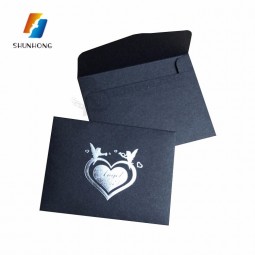 Envelopes de papel kraft preto com logotipo para vendas por atacado