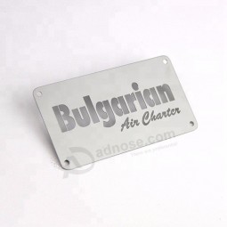 Small polished stainless steel logo tags supporting custom size