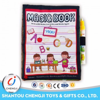 Heißes Verkaufswasserleinwandspielzeug, das magisches Buch für Kinder zeichnet