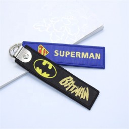 Fabrik-Preis fertigte Stickerei-touristisches Andenken-Gewebe Keychain von China besonders an