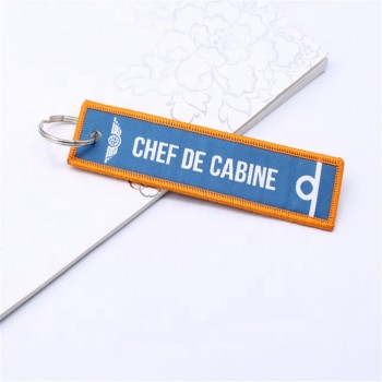 china factory direct custom flight embroidery keychain woven key tag
