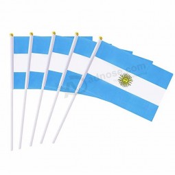 Small mini plastic flagpole Argentina hand waving flag with golden top