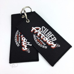 고품질 컬러 로고 패브릭 수 놓은 열쇠 고리를 제거