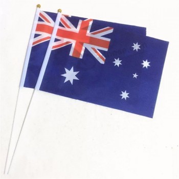オーストラリアスティックフラグ手に小さなオーストラリア国旗を開催