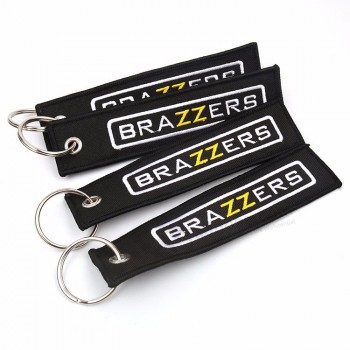 mode hoofdlabels machine zwarte twill geborduurde kleding sleutelhangers met letters logo